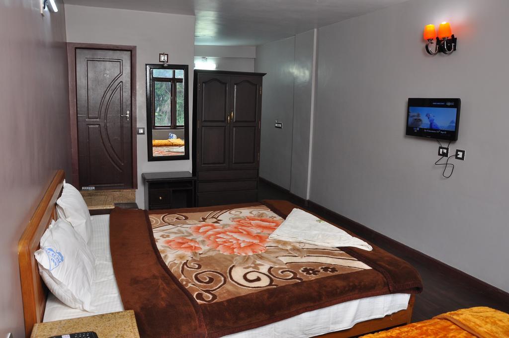 Grand Paradise Inn Kodaikanal Bilik gambar